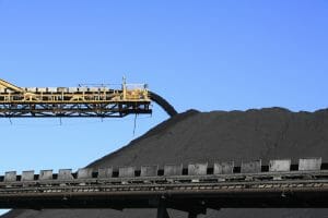 A conveyor belt carrying coal.
